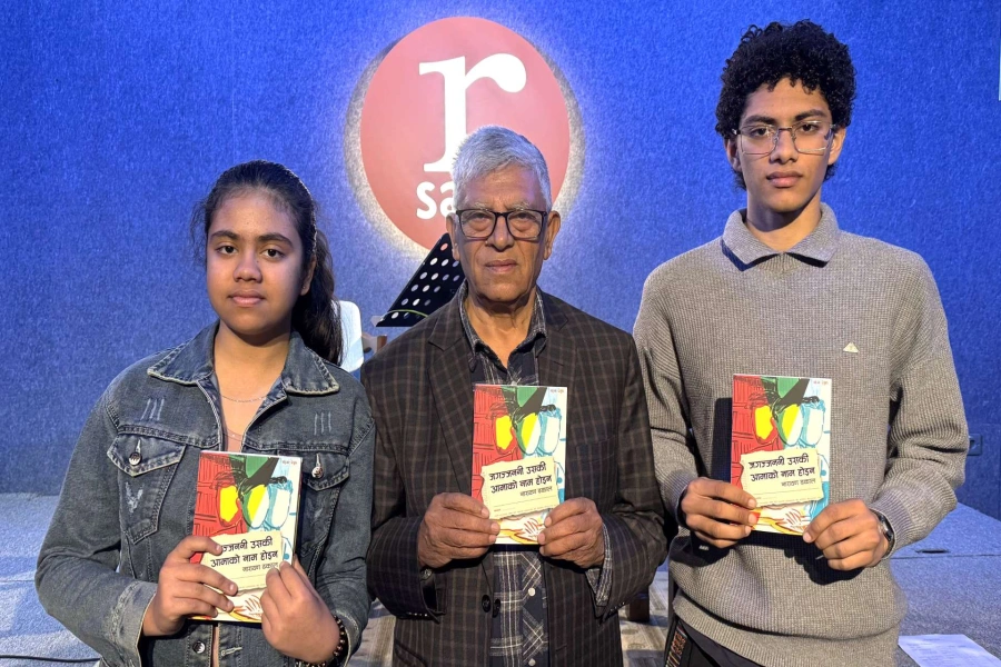 02 Author Narayan Dhakal launches his book along with his grand children-1771818500.webp